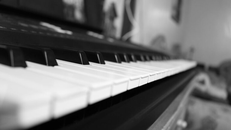 Grayscale Photo of Piano Tiles